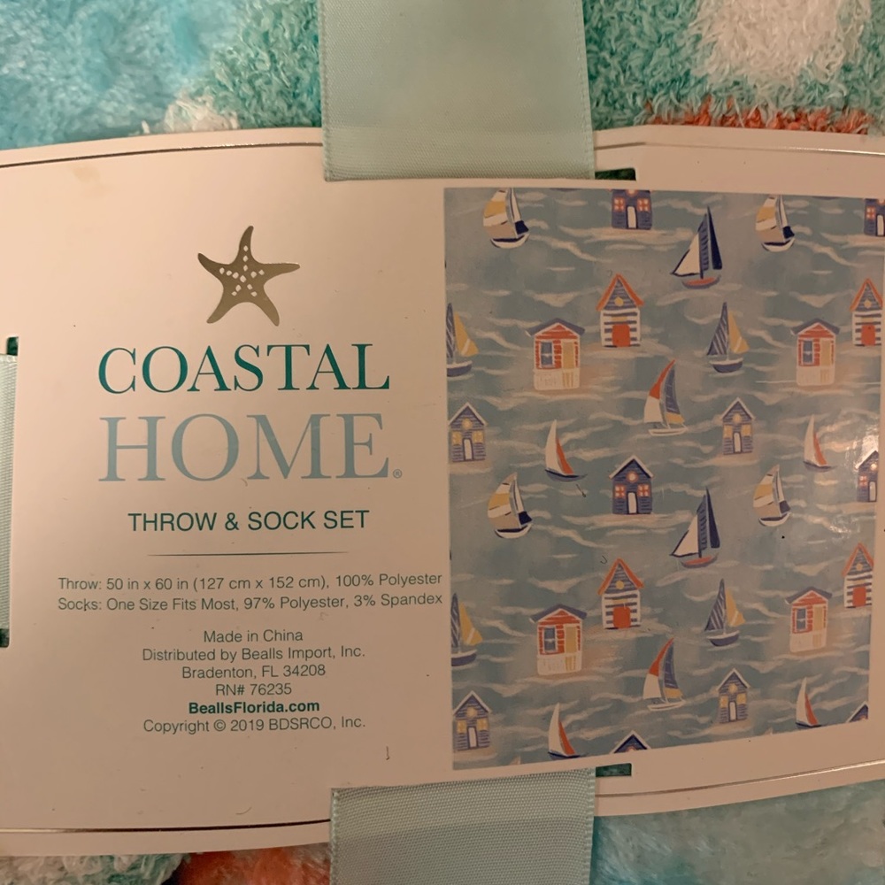 Hostile home throw and sock set! NEW never used.